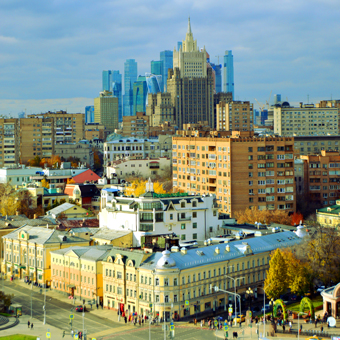 A Russian cityscape view with new skyscrapers flanked by traditional lower buildings