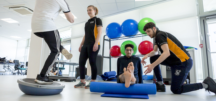 Sport rehab students working with patients