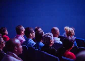 audience sat in an auditorium