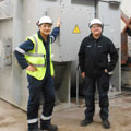 Ray pictured with colleague in China modifying an 11MW Siemens Drive.
