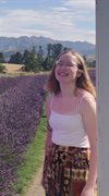 Archaeology student Emily LeHegarat, standing in a field of lavender