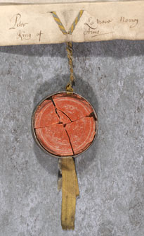 Broken seal inside metal skippet attached to a licence from Peter le Neve, Norroy King of Arms, 1706 (MD 682)