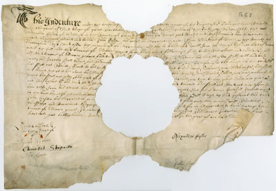 Title deed which has been folded and then partially eaten by rodents (Pa E 8)
