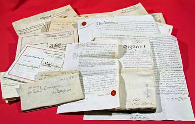 Photograph of a bundle of title deeds, 1742-1817 (Ne 6 D 2/31/1-21)