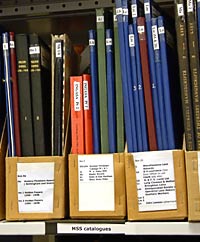 Archive catalogues on a shelf
