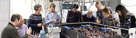 Academics with technology that will form part of the new Quantum Technology Hub