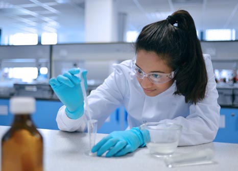 Female student working in a lab
