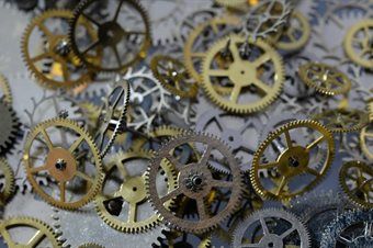 gold and silver metal cogs