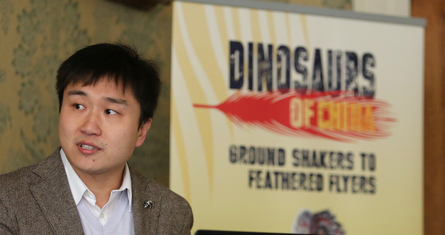 Dr Wang Qi at the Dinosaurs of China exhibit