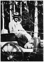 Lawrence in a carriage in Paris