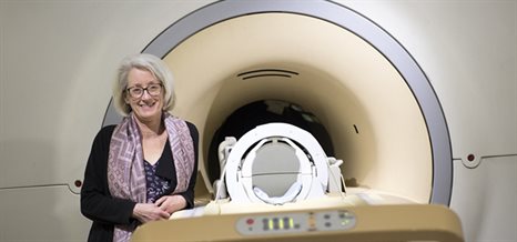 Professor Penny Gowland standing in front of the MRI scanner - MRI