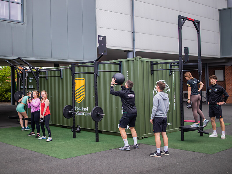 An exercise class using The Fit Box (outdoor fitness equipment) at Jubilee Sports Centre, located on Jubilee Campus