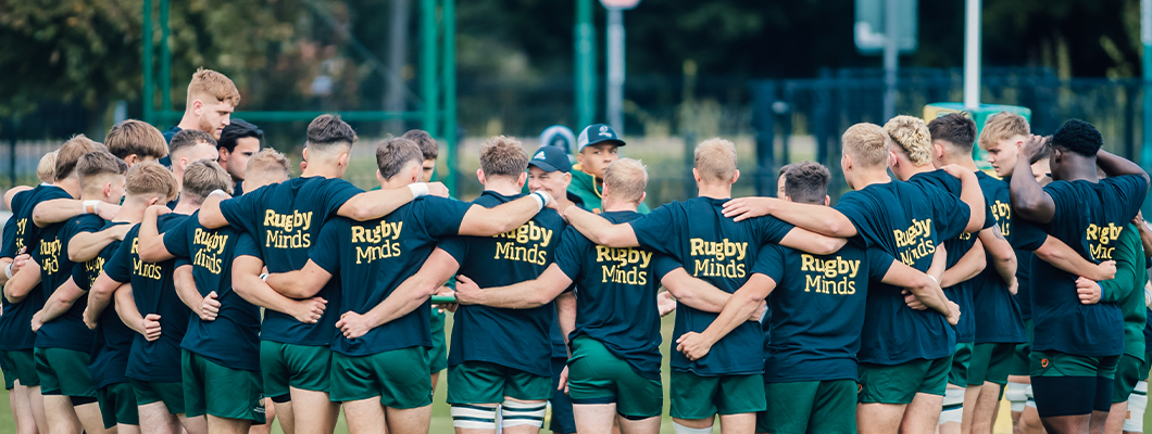 Rugby players stand together wearing Rugby Minds T Shirts