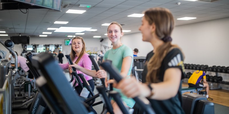 Female students at the Jubilee campus fitness suite