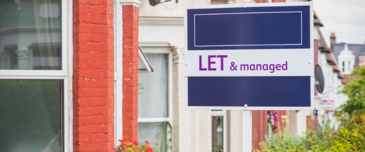 Let and managed sign displayed outside a terraced house