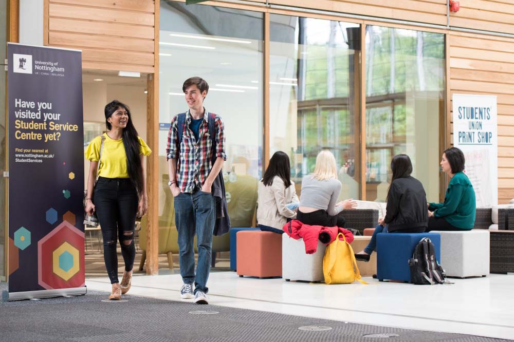 Students outside the Student Services hub in the Exchange Building on Jubilee Campus