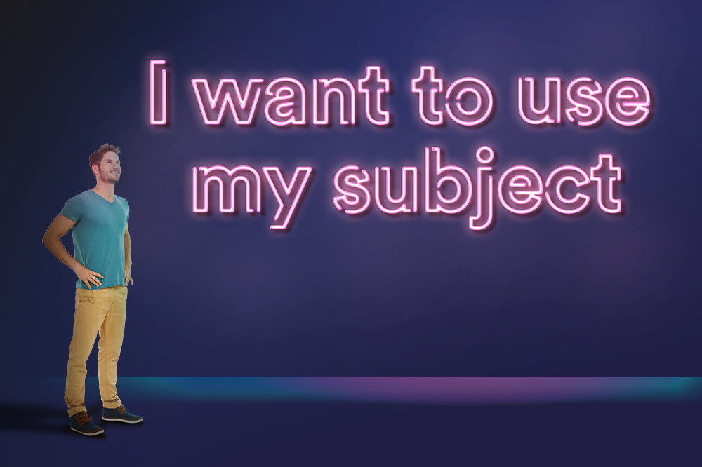 Student looking at a neon sign saying 'I want to use my subject'