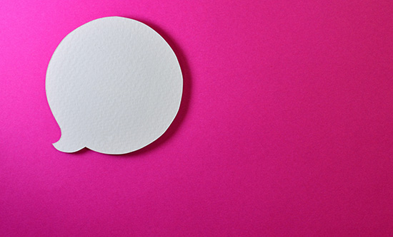 White speech bubble on pink background