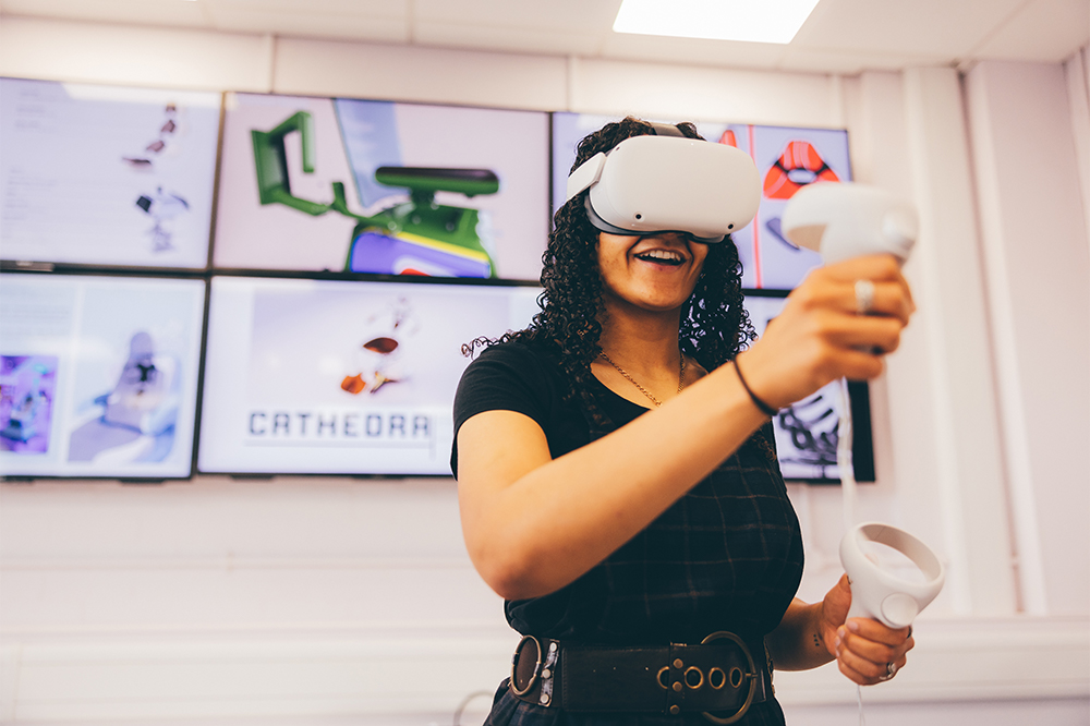 Undergraduate student using a virtual reality headset in the Product Design Studio