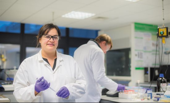 Professor Rachel Gomes standing in a laboratory