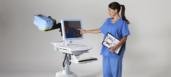 A medical professional using the burns scanner