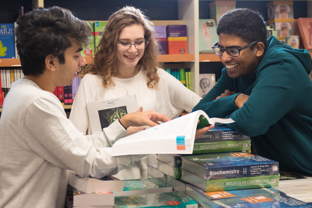A group of students browsing in Blackwell's bookshop