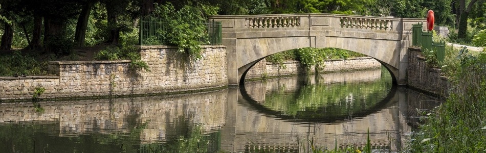 Bridge over water lake with reflection