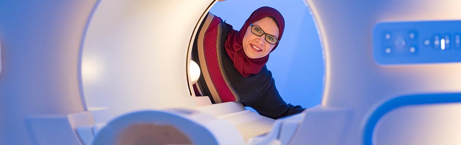 Dr Sally Eldeghaidy working with an MRI Scanner in the Sir Peter Mansfield Imaging Centre