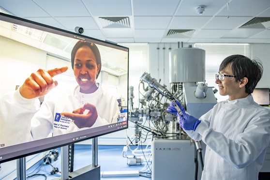 Video call between two scientists in a lab