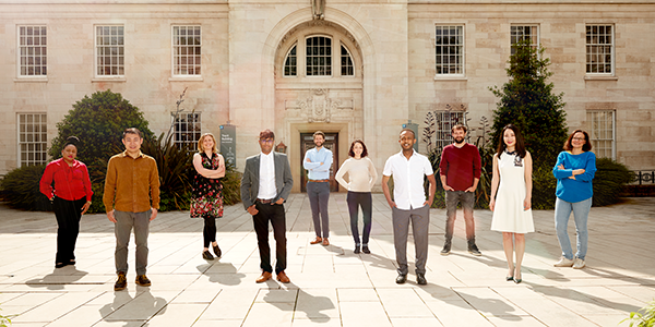 Photograph of a group of people stood in the Trent Building courtyard