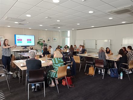 Staff teams receiving task-related instructions