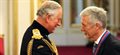 Global slavery expert is honoured by Prince Charles