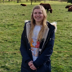 Fern Baker with cows in the background