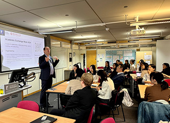 Staff and students from the East China Normal University are welcomed to the School of Education by Professor Howard Stevenson