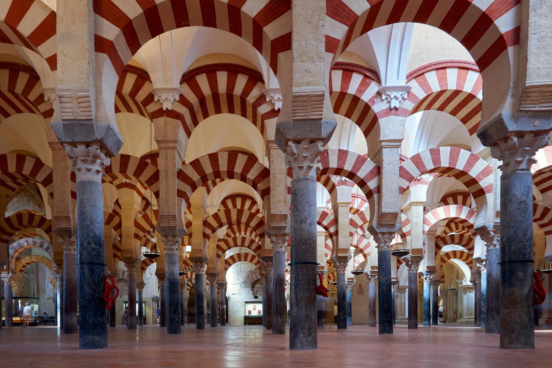 Inside of Cordoba cathedral showing repetitive mosque arches