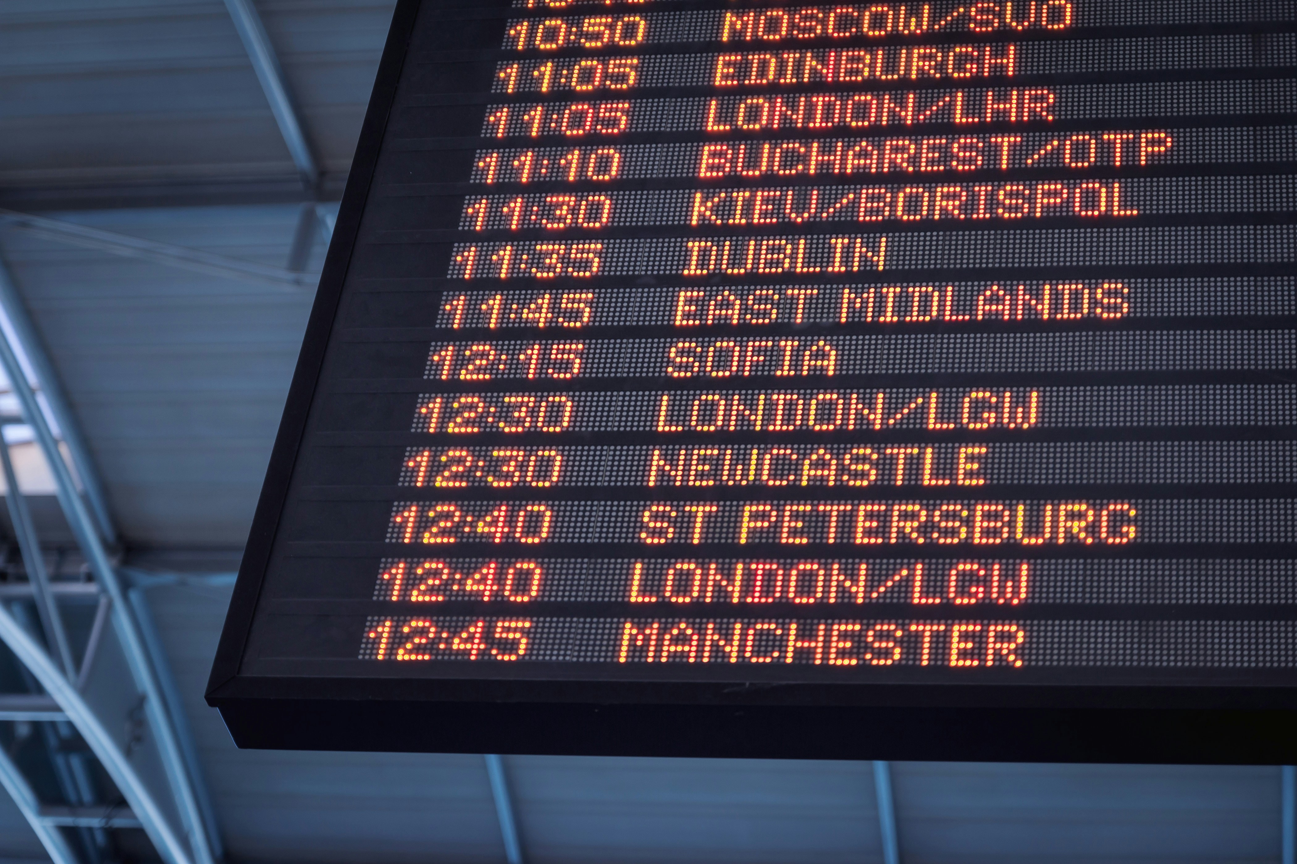 A departures board at an airport