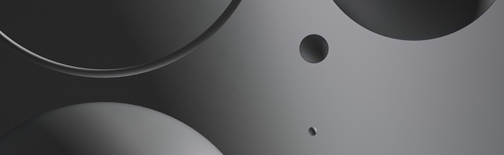 Spheres on a background fading from black to grey