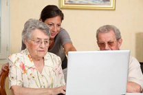 Older people looking at a computer