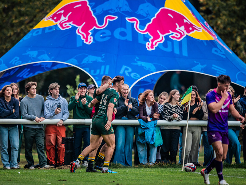 The Men's Rugby Union XI players celebrating a try at the BUCS Super Rugby Headliner in partnership with Red Bull.