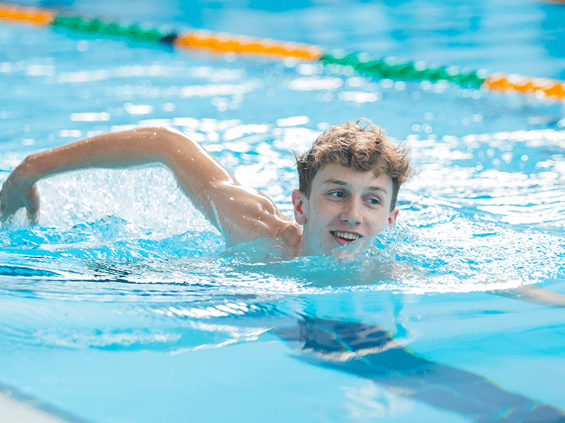 A student swimming in our swimming pool at David Ross Sports Village