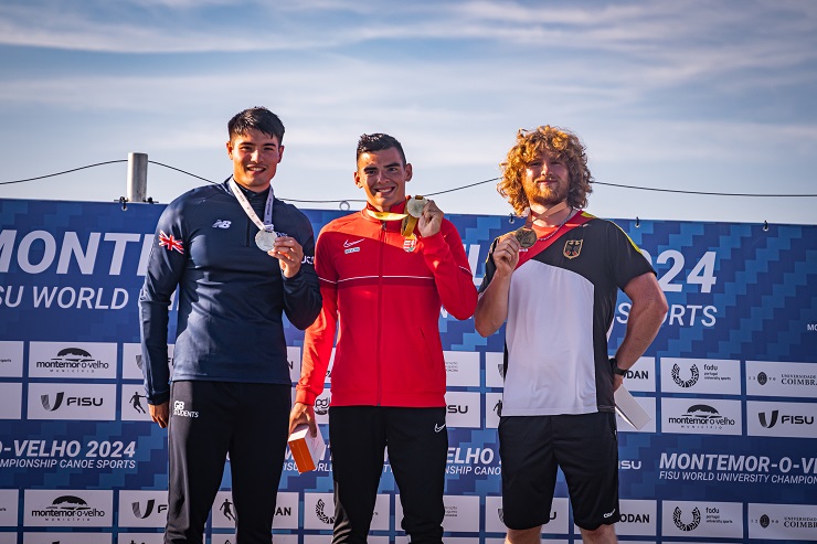 Tom Lambert - University of Nottingham canoeist on the podium with his medal