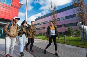 students walking past the Institute of Mental Health, Jubilee Campus
