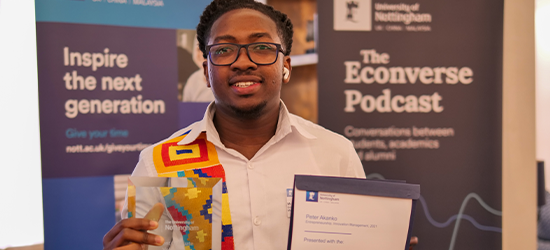 Peter Akanko with his Recent Graduate of the Year Award at the 2024 Volunteer Awards