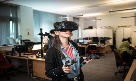 A woman wearing a virtual reality headset