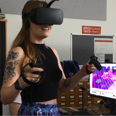 Student wearing virtual reality headset exploring 3D environment