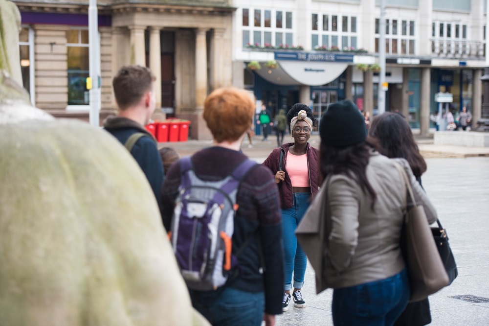 Students in Nottingham City Centre's Old Market Square