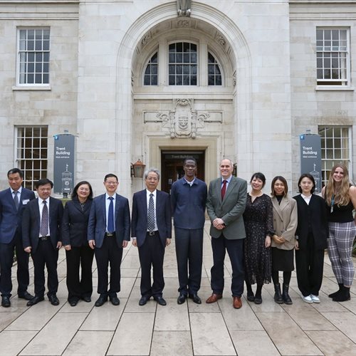 CICO delegates and representatives from University of Nottingham standing in the Trent Building courtyard