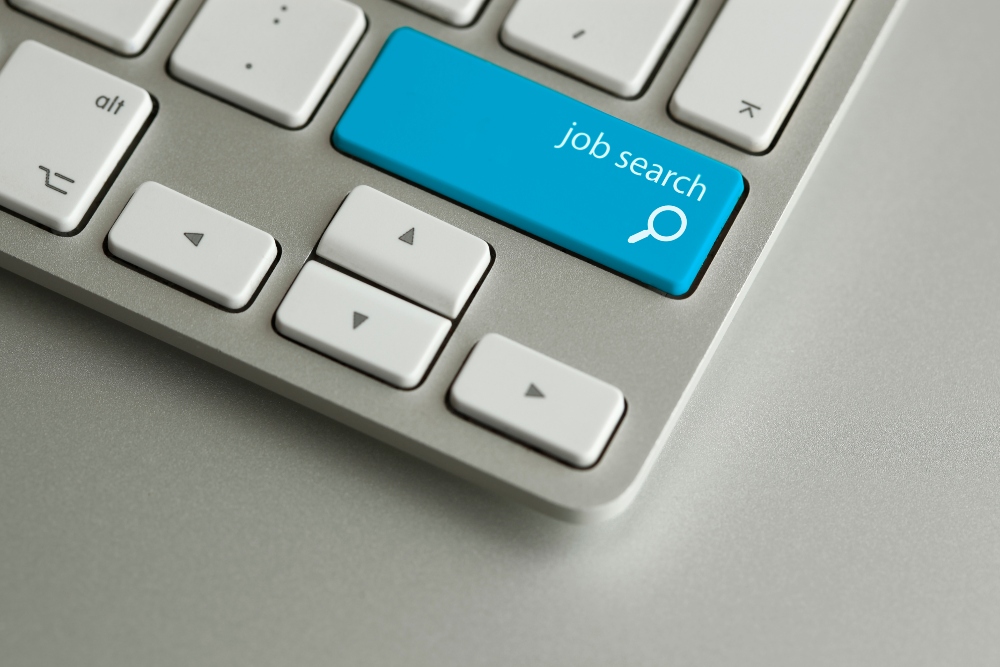 A keyboard with a the return button labelled Job search