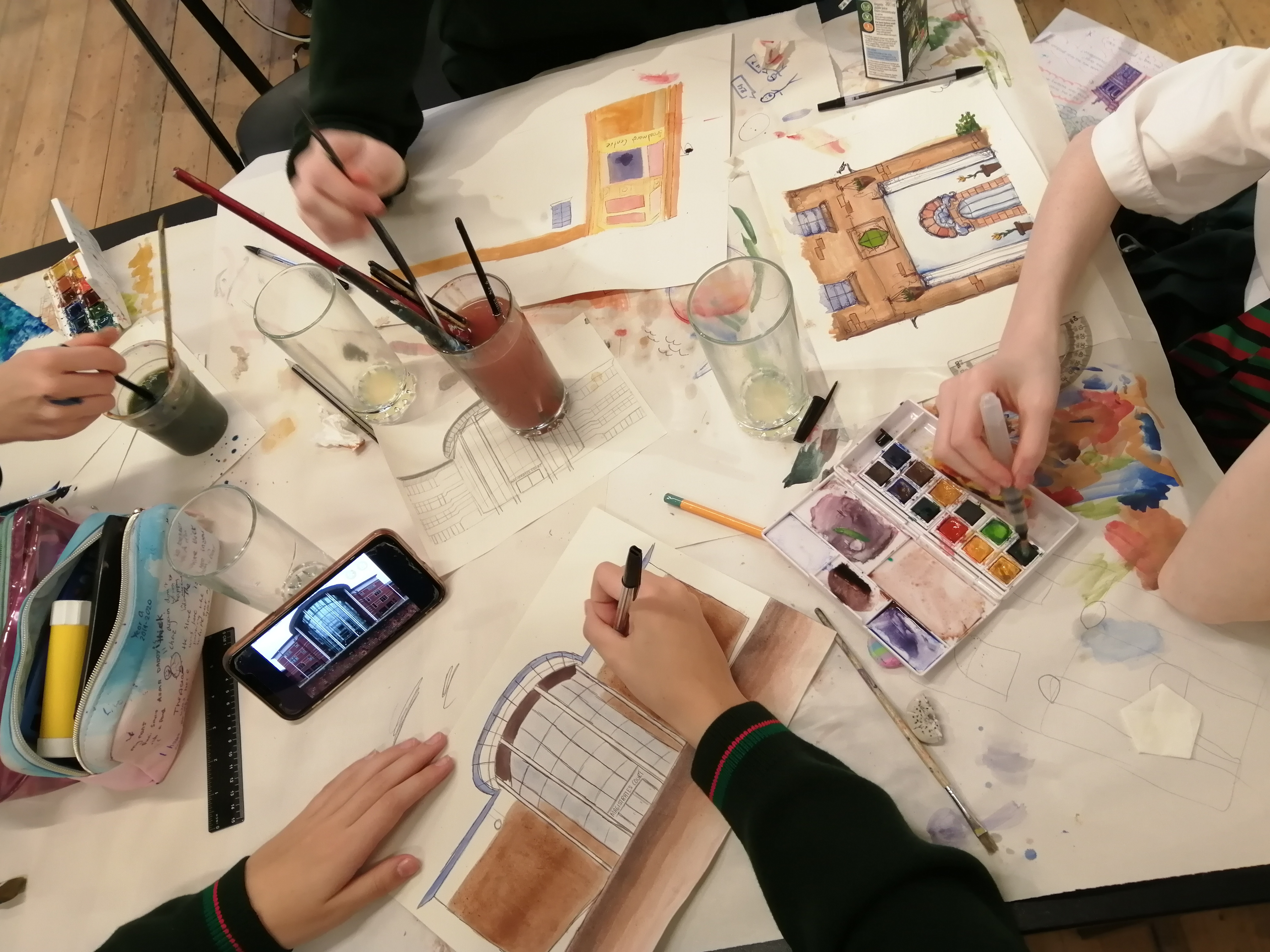 A photo of children painting local buildings in Nottingham