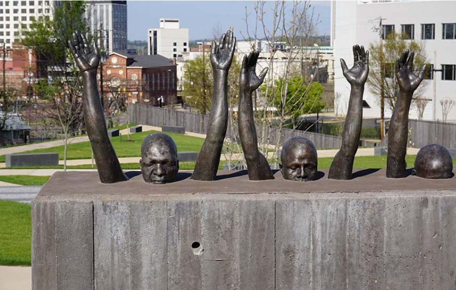 A photo of a sculpture of people